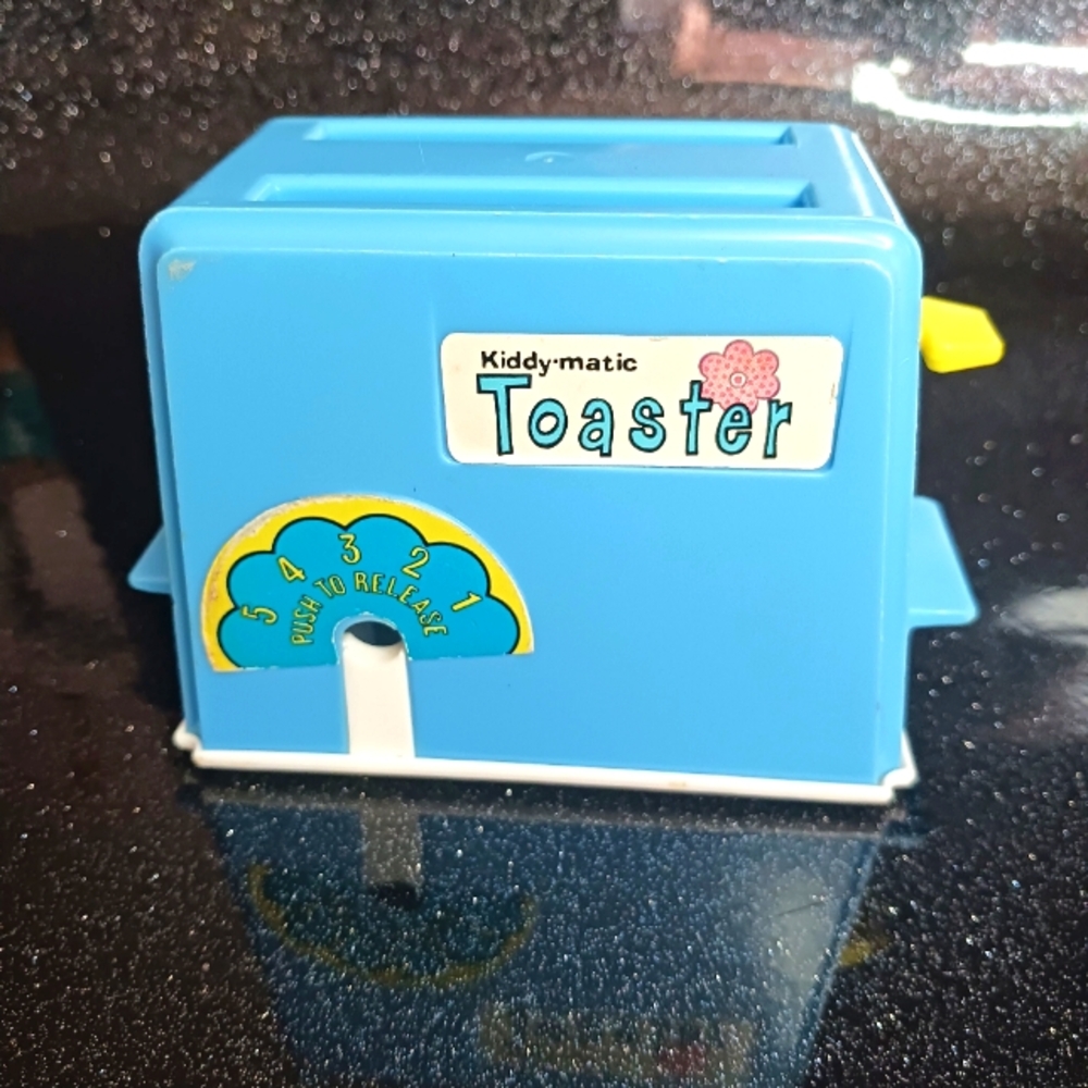 Vintage 80s Chilton Globe Kiddy-Matic Play Food Toaster.